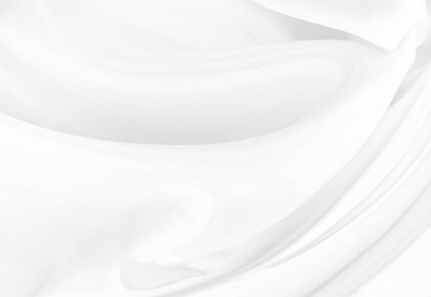 istock White gray satin texture that is white silver fabric silk background with beautiful soft blur pattern natural. 2155759081