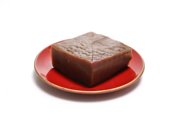 Sweet rice jelly on a plate isolated on a white background.