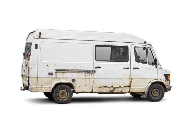 istock Old rusty dirty delivery van side view isolated on a white. Cargo short-base minibus. Vehicle recycling concept. 2155761385