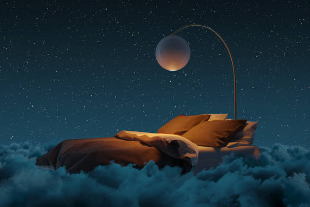 istock Cozy bed illuminated by ball lamp. The bed flying over fluffy clouds at night. 3D Rendering 2155764692
