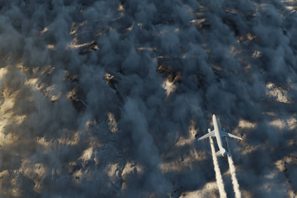 istock airplane with contrails flying over cloudscape in the evening sunlight. 3D Rendering 2155764808