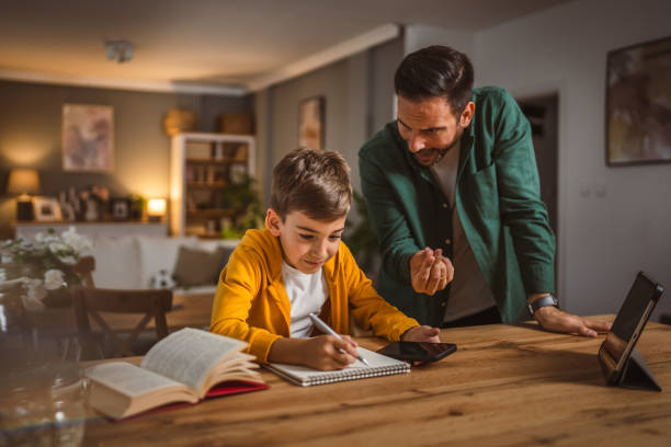 istock Angry father yell at his son to do homework as soon as possible 2155772184