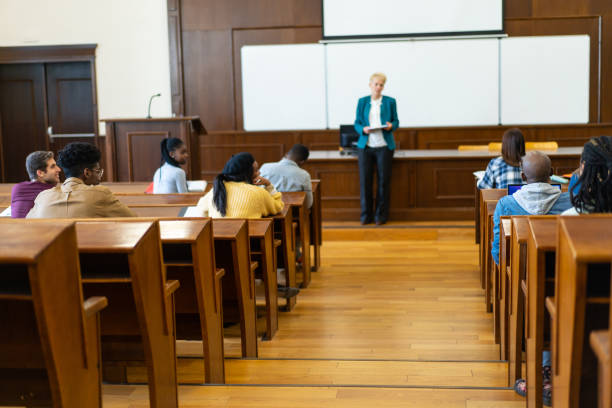 istock A university professor at the front of a lecture hall 2155774660