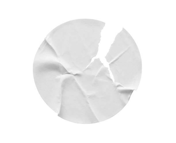 istock Blank white round torn paper sticker label isolated on white background 2155774722