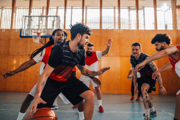 istock Multiracial teammates training defense and dribbling during a game or practice 2155775589