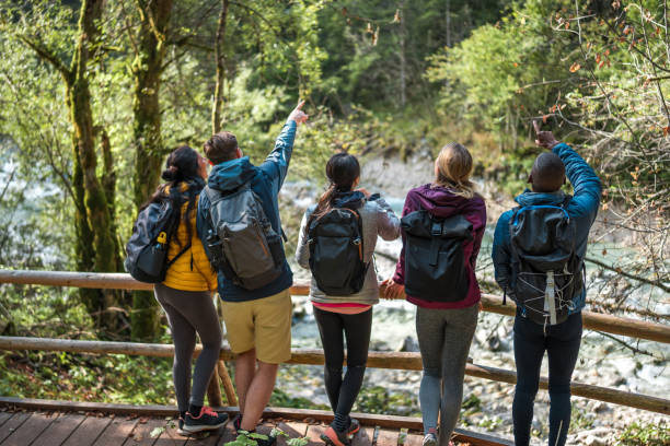 istock Group of Diverse Friends Enjoying a Hike in the Woods 2155777964