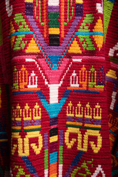 istock A colorful, multicolored, and intricately designed red and green blanket 2155780641