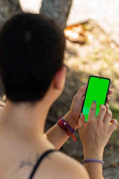 istock A young woman interacting with her phone 2155782389