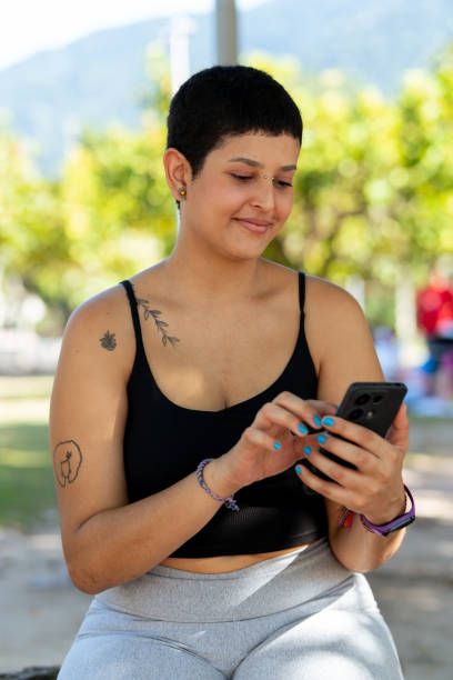 istock A young woman interacting with her phone 2155782395