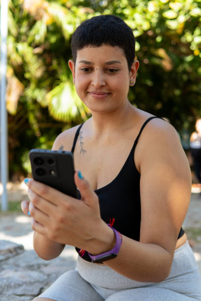istock A young woman interacting with her phone 2155782405