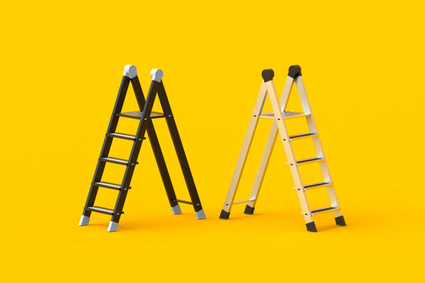 istock Two foldable stepladders on orange background. Portable aluminum ladders. Household tool. Instrument for renovation. 3d render 2155782454