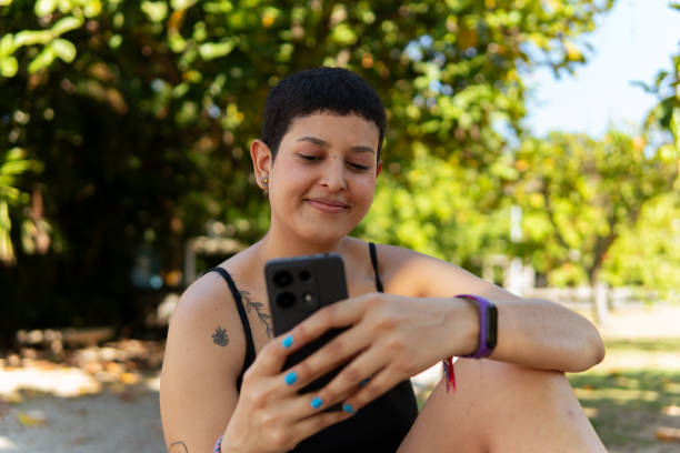 istock A young woman interacting with her phone 2155782460