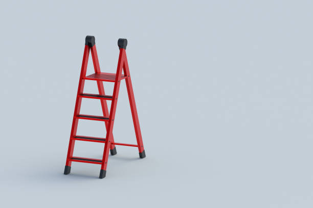 istock Red foldable stepladder on gray background. Portable aluminum ladder. Household tool. Instrument for renovation. Copy space. 3d render 2155782461
