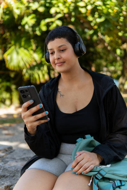 istock A young woman interacting with her phone 2155782464
