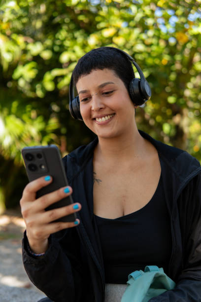 istock A young woman interacting with her phone 2155782465