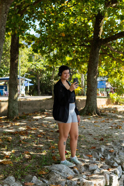 istock A young woman interacting with her phone 2155782556