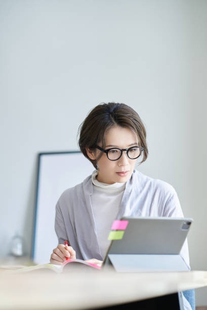istock A woman working in a room 2155784500