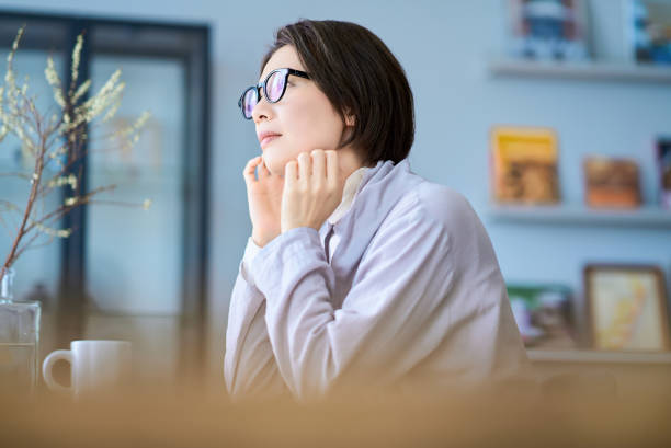 istock A middle-aged woman thinking 2155785053