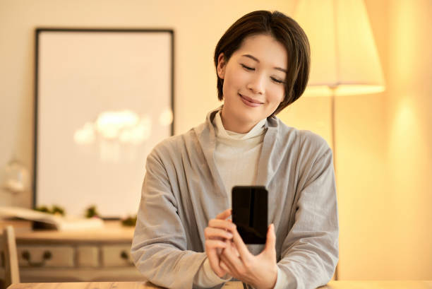 istock A woman operating a smartphone 2155785671