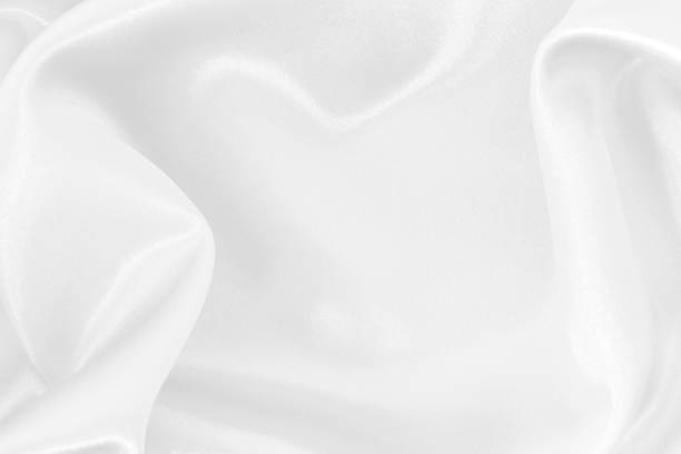 istock White fabric texture for background and design, beautiful pattern of silk or linen. 2155787578