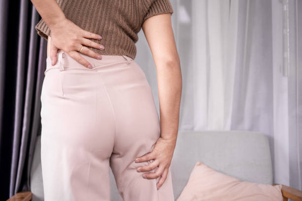 istock Sciatica concept with woman feeling nerve pain from lower back  to legs 2155790177