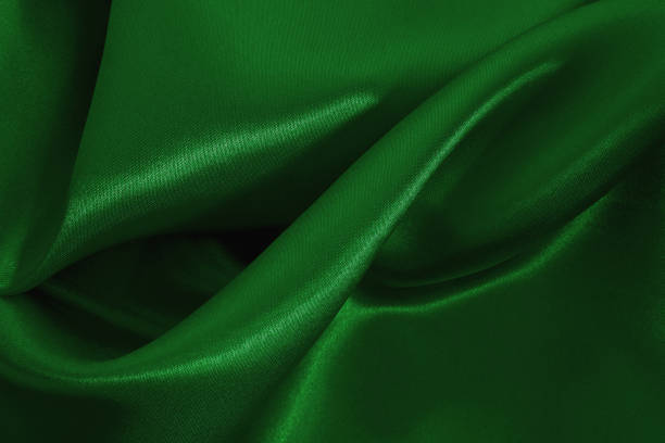 istock Green emerald fabric texture background, detail of silk or linen pattern. 2155790465