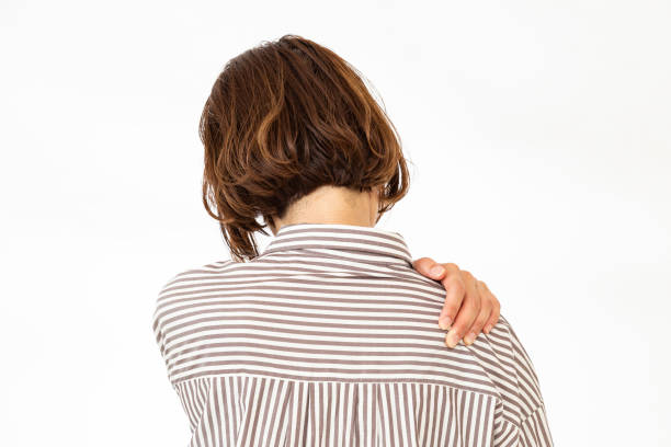 istock A woman suffering from stiff shoulders. 2155790830