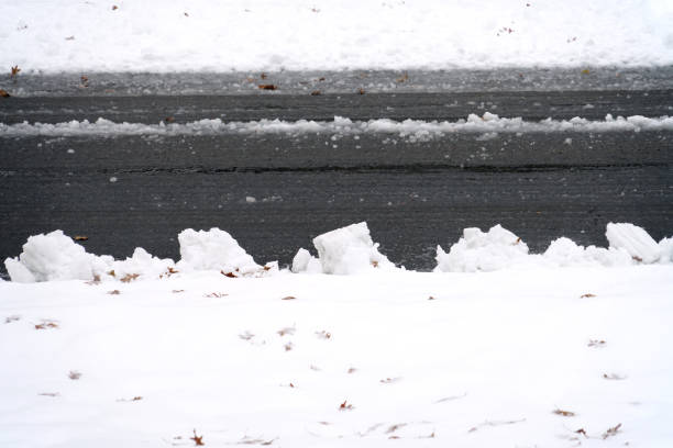 istock Close up on snow bank at the road side 2155792542