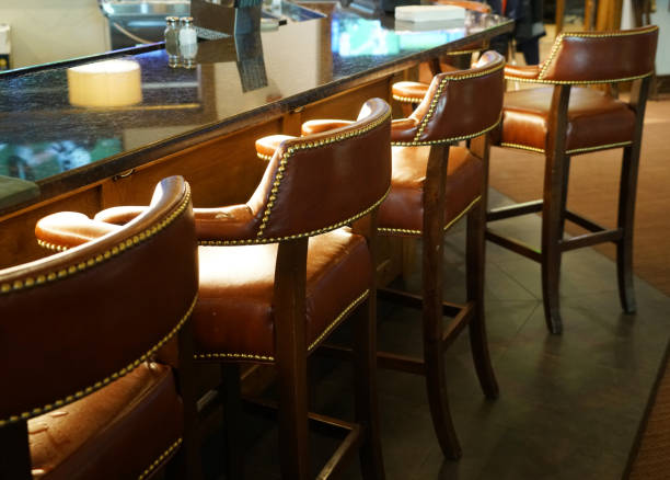 istock chairs in a row in the bar 2155793141