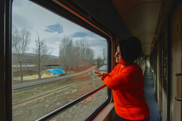 istock Woman traveling on the Eastern Express 2155798100