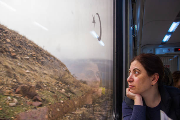 istock Woman traveling on the Eastern Express 2155798939