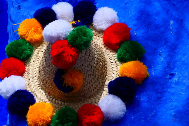 Chefchaouen, Morocco: straw hat in the alley