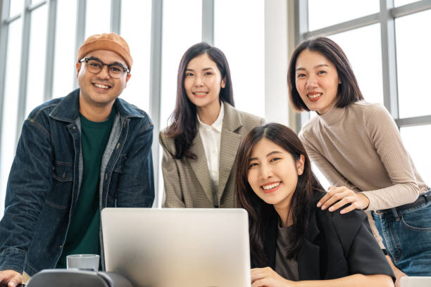 istock Asian business start up freelance people team analyzing statistics financial. Group Team of businesspeople man and woman Meeting Conference Discussion various topic Corporate Concept in office. 2155803595