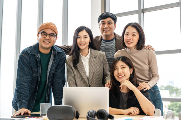 istock Asian business start up freelance people team analyzing statistics financial. Group Team of businesspeople man and woman Meeting Conference Discussion various topic Corporate Concept in office. 2155803603