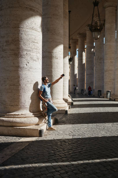 istock Young male tourist exploring big city 2155805478