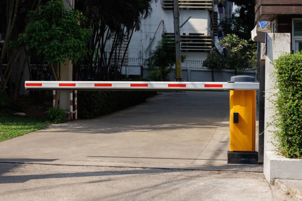 istock A red and white traffic barrier with a yellow box on top 2155806984