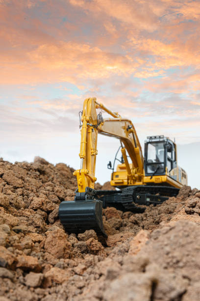 istock Selective focus ,Excavator with Bucket are digging the soil in the construction site . 2155807215
