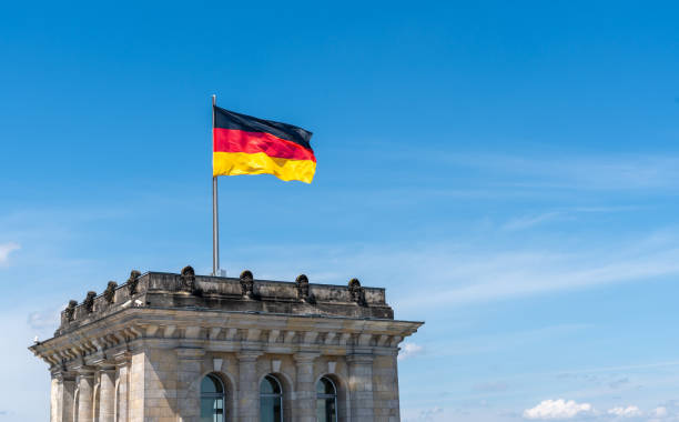 istock Germany flag on top of Reichstag tower 2155807254