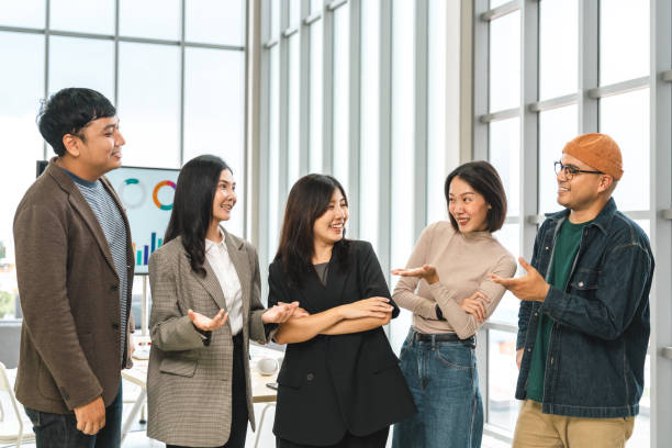 istock Asian business start up freelance people team analyzing statistics financial. Group Team of businesspeople man and woman Meeting Conference Discussion various topic Corporate Concept in office. 2155807468