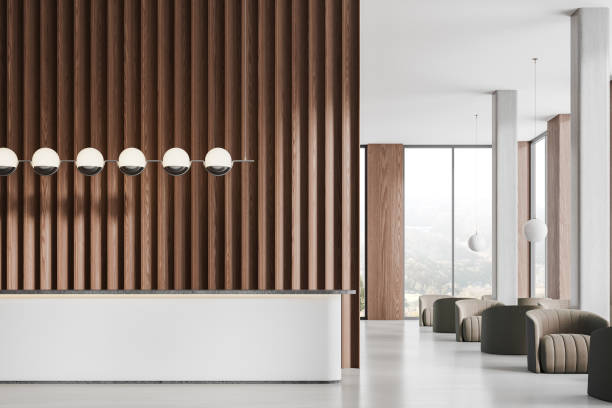 istock Stylish hotel interior lobby and reception desk, panoramic window 2155808439