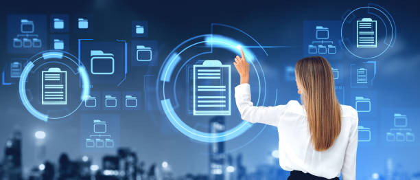 istock Businesswoman finger touch document management database hologram with files 2155808826