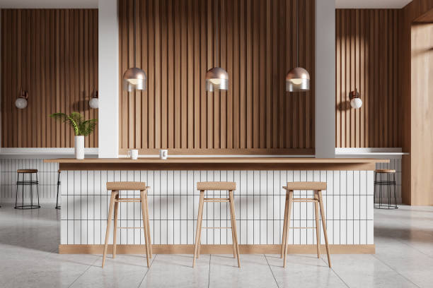 istock Stylish coffee shop interior with bar island and eating spaces 2155808936