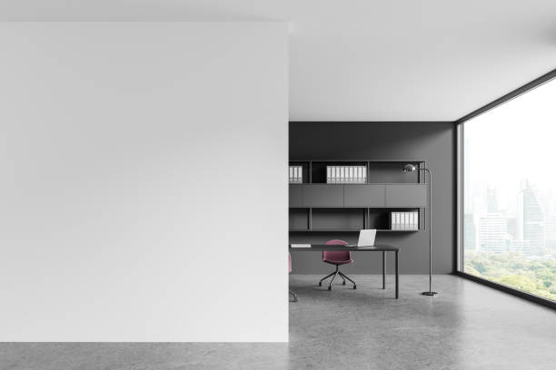 istock Stylish workspace interior with desk and shelf, panoramic window. Mock up wall 2155809256