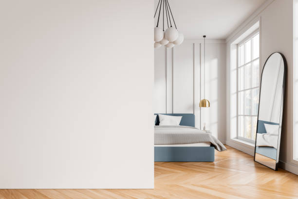 istock Modern hotel bedroom interior with bed and mirror, window. Mock up wall 2155809560