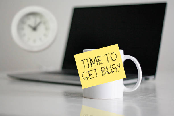 istock Time to Get Busy is shown as motivational text 2155812614