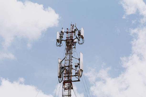 istock Cellular network towers or internet communications background as blue sky. 2155821102