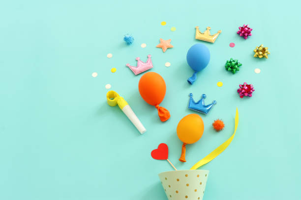 Top view image of party and birthday item on blue background