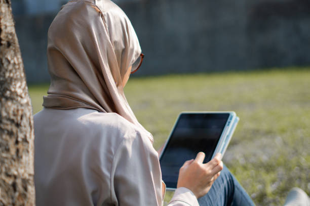 istock Muslim woman doing activity outdoor during summer 2155825122