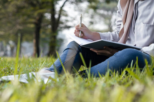 istock Muslim woman doing activity outdoor during summer 2155826304