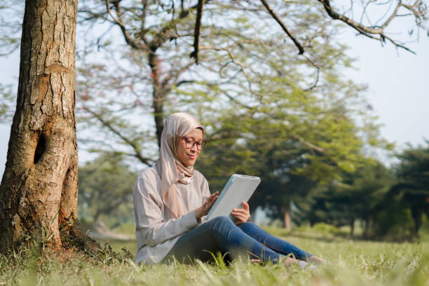 istock Muslim woman doing activity outdoor during summer 2155826676